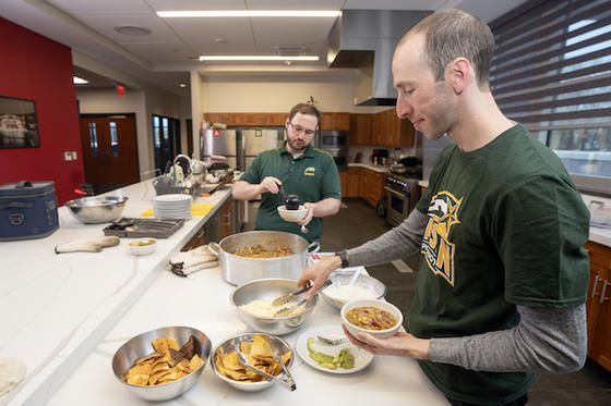 Registered dietician students cook nutritious meals for local firefighters